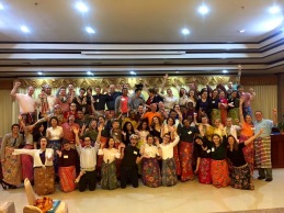 Our PC Group of 66! The ladies wearing the traditional Pa Tungs and the men wearing Pa Kaw Ma.